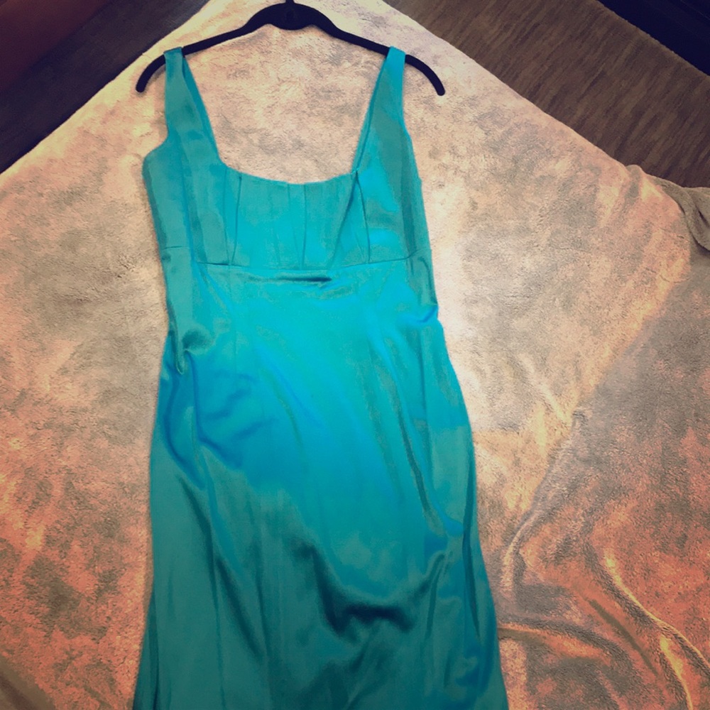 Cocktail dress. Teal color.